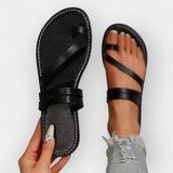 Plokšti sandalai su pynimu